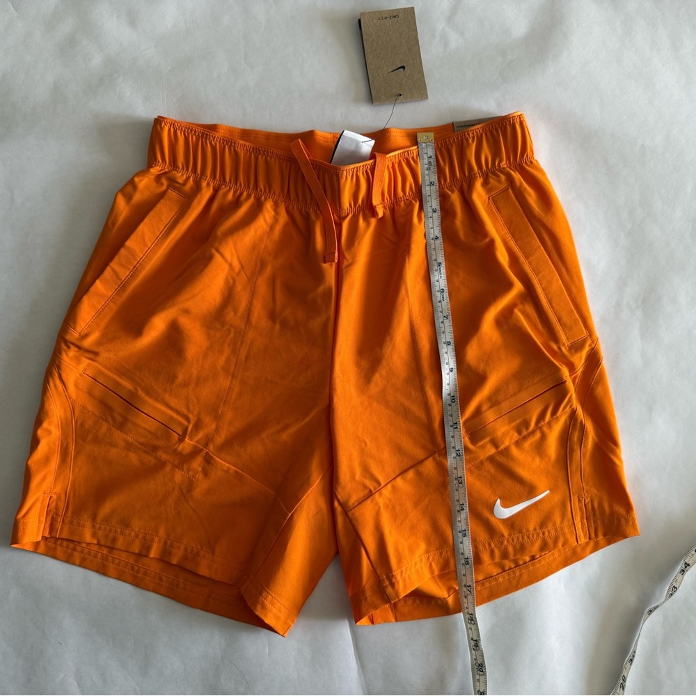 Nike Orange Athletic Shorts with White Swoosh